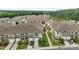 An overhead shot showcasing the layout of a large townhome community with attached garages at 1102 Latitude Dr, Durham, NC 27713