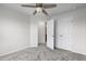Bedroom boasts gray carpet, a closet, and an attached bathroom entrance at 1102 Latitude Dr, Durham, NC 27713
