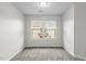 Neutral bedroom with gray carpet and one window providing natural light at 1102 Latitude Dr, Durham, NC 27713
