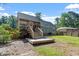 Backyard showing deck, screened porch, lawn, and established landscaping at 111 Mcdole Cir, Cary, NC 27511
