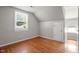 Attic bedroom has hardwood floors, and a window to the outside at 111 Mcdole Cir, Cary, NC 27511