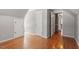 Attic bedroom with hardwood floors and a double-door closet on an angled wall at 111 Mcdole Cir, Cary, NC 27511