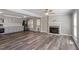 Open layout between the kitchen and living room offers abundant hardwood floor space at 111 Mcdole Cir, Cary, NC 27511
