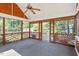 Screened porch with view of backyard, wood frame and neutral carpet at 111 Mcdole Cir, Cary, NC 27511