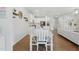 Bright and open concept featuring dining room, kitchen, and living room areas at 1112 Prewitt Ranch Dr, Holly Springs, NC 27540