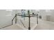 Bright loft area with a modern staircase, neutral carpeting, and comfortable seating for relaxation at 1112 Prewitt Ranch Dr, Holly Springs, NC 27540