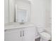 This bathroom features a modern vanity with white cabinets and a luxurious quartz countertop at 112 Moonflower Ln # Homesite 267, Wilson's Mills, NC 27520