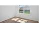 Bright bedroom with view of backyard and natural light at 112 Moonflower Ln # Homesite 267, Wilson's Mills, NC 27520