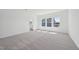 Bedroom with plush carpet and freshly painted white walls, offering ample space and bathroom access at 112 Moonflower Ln # Homesite 267, Wilson's Mills, NC 27520