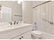 Cozy bathroom with white vanity, white toilet, and shower with curtain at 119 Danforth Dr, Cary, NC 27511