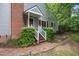 Beautiful home with brick pathway, well-maintained lawn and inviting front porch at 119 Danforth Dr, Cary, NC 27511