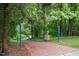 Greenway entrance, with signage, benches and lush greenery at 119 Danforth Dr, Cary, NC 27511