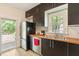 Well-lit kitchen with stainless steel appliances, wood countertops and sleek cabinetry at 119 Danforth Dr, Cary, NC 27511