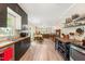 Bright kitchen with an open floor plan connecting to the dining and living areas at 119 Danforth Dr, Cary, NC 27511