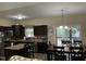 Open kitchen and eat-in dining area provide ample space for cooking and entertaining at 119 Hunterwood Pl, Benson, NC 27504