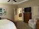 Spacious main bedroom with neutral tones, plush carpet, and ensuite bathroom access at 119 Hunterwood Pl, Benson, NC 27504