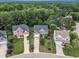 Aerial view of the neighborhood showcasing the home's location and surrounding landscape at 1237 Shirehall Park Ln, Wake Forest, NC 27587