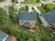 Aerial view of a backyard with a lawn, deck, and fence at 1237 Shirehall Park Ln, Wake Forest, NC 27587