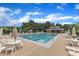 The sparkling pool, surrounded by lounge chairs, is a refreshing community amenity at 1237 Shirehall Park Ln, Wake Forest, NC 27587