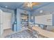 Organized playroom featuring a whiteboard, alphabet border, shelving for toys, and natural light at 1237 Shirehall Park Ln, Wake Forest, NC 27587
