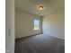Bright bedroom with plush carpeting and a window offering natural light at 128 Bruce Dr, Dunn, NC 28334