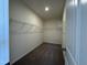 Walk-in closet with wire shelving and neutral carpeting at 128 Bruce Dr, Dunn, NC 28334
