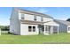 Home exterior showcasing a screened porch and a well-maintained backyard at 140 Benson Village Dr # 83, Benson, NC 27504