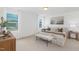 Bright main bedroom with carpet flooring, natural light, and a comfortable seating area at 140 Benson Village Dr # 83, Benson, NC 27504