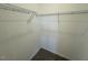 Walk-in closet boasts metal shelving, providing ample and well-organized storage, perfect for any wardrobe at 140 Brookhaven Dr, Spring Hope, NC 27882
