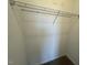 Walk-in closet features metal shelving and neutral carpeting, providing an efficient and organized storage space at 140 Brookhaven Dr, Spring Hope, NC 27882
