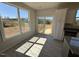 Eat-in kitchen featuring natural light and a glass door leading to outdoor deck at 140 Brookhaven Dr, Spring Hope, NC 27882