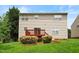 Inviting backyard features a wooden deck, a well-maintained lawn, and mature trees, offering a private retreat at 1405 Merrilow Ct, Wake Forest, NC 27587