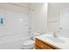 Bright bathroom featuring a shower and tub, sink, and neutral walls at 1405 Merrilow Ct, Wake Forest, NC 27587