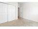 Bedroom featuring carpet, large closets, and neutral walls at 1405 Merrilow Ct, Wake Forest, NC 27587
