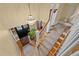 Inviting foyer with a crystal chandelier, staircase, and hardwood floors creates an elegant and welcoming entrance at 1501 Chatsworth Ln, Raleigh, NC 27614