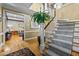 Grand foyer featuring hardwood floors, a staircase, and an open view to the formal living area at 1501 Chatsworth Ln, Raleigh, NC 27614