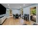 Recreation room with tile floors, windows, and furniture, perfect for activities and relaxation at 1501 Chatsworth Ln, Raleigh, NC 27614