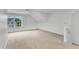 Spacious bedroom featuring a large window with neighborhood views at 151 Bridge St, Hillsborough, NC 27278