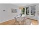 Bright dining area with a modern table, stylish chairs, and natural light at 151 Bridge St, Hillsborough, NC 27278