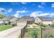 Back exterior featuring a screened porch, paver patio, and landscaped backyard at 151 Bridge St, Hillsborough, NC 27278