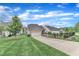 Well-maintained home with a lush lawn and a long driveway at 151 Bridge St, Hillsborough, NC 27278