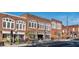 Charming brick building with large windows, offering a unique commercial or residential space at 151 Bridge St, Hillsborough, NC 27278