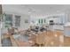 Bright, open-concept living area featuring hardwood floors and comfortable seating at 151 Bridge St, Hillsborough, NC 27278