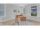 Stylish home office featuring a wooden desk, sleek decor, and bright natural light at 151 Bridge St, Hillsborough, NC 27278