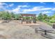 Shady picnic area with tables and a trellis offers a relaxing outdoor space at 151 Bridge St, Hillsborough, NC 27278