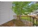 Wooden deck with wood railing overlooking the yard at 151 Lake Pine Dr, Cary, NC 27511