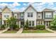 Charming townhome with well-manicured lawn and landscaping, perfect for curb appeal at 1728 Shady Oaks Dr, Wendell, NC 27591