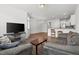 Open concept living room offering seamless flow for entertaining and everyday living at 1728 Shady Oaks Dr, Wendell, NC 27591