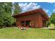 Community pavilion with fireplace, open air design, outdoor seating, and corn hole game at 1728 Shady Oaks Dr, Wendell, NC 27591