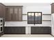 The kitchen features a large window with mountain views, custom cabinets, stainless appliances, and marble backsplash at 1808 Stream Manor Ct, Wake Forest, NC 27587